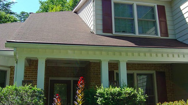 Home with brick front and white trim.